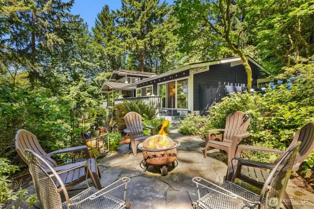 a firepit area in the garden allows year-round fun