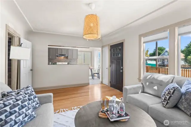 The open layout of the main floor helps this home live large! Bright paint, bamboo flooring and a fun light fixture create a perfectly move-in ready home.