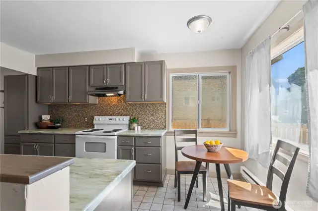 Enjoy a morning bagel or afternoon tea in the sweetest dining nook next to your kitchen. The natural light pours in through large windows and you will love the bright and airy feel.
