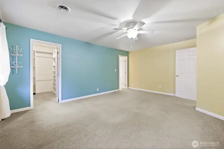 Another view of the primary bedroom