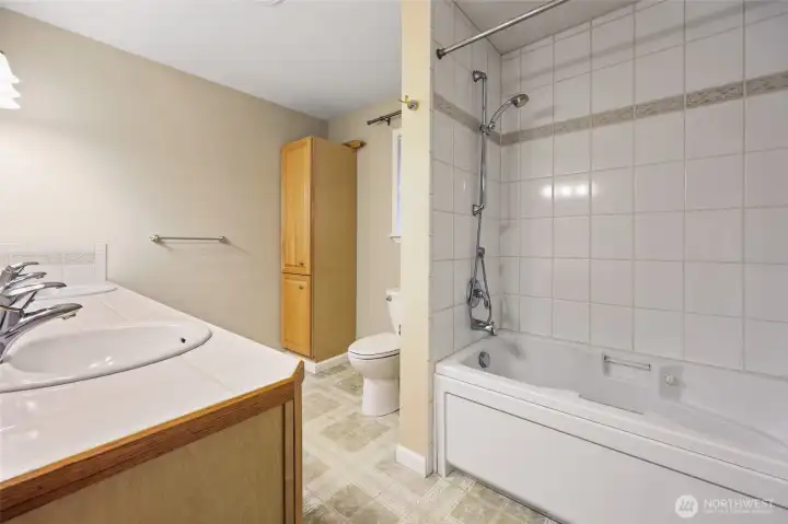 Primary Bedroom bath.  Lots of room if you'd like to remodel