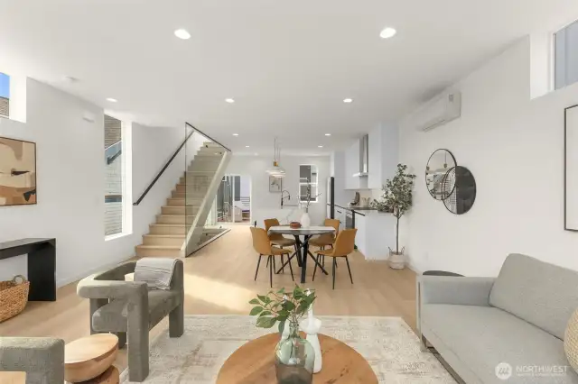 Step inside to soaring ceilings, abundant light, and an open-concept design made for modern living.