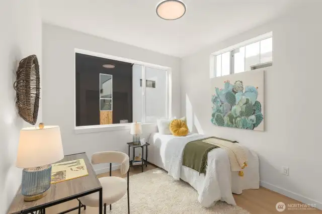 A private guest suite with ensuite bath creates comfort and independence for visitors, family, or flexible work-from-home space.