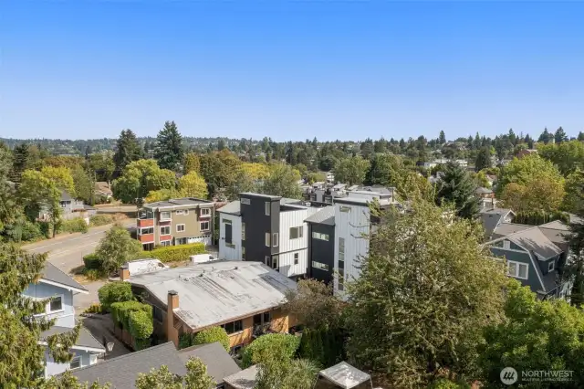 The community sits in a prized location, with tree-lined streets, nearby parks, and effortless access to shops and cafes.