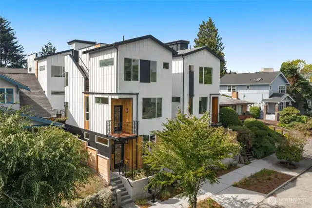 Surrounding greenery and urban conveniences create a rare balance — a modern home tucked into a thriving community with easy access everywhere.