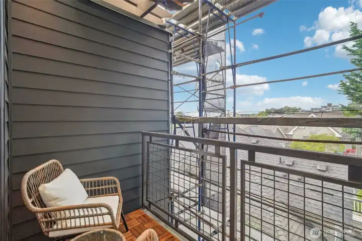 Sweet north-facing balcony lets you take in treetop views and sweet sunshine.