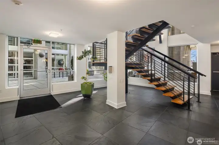 Sleek, secure, and stylish lobby entrance.