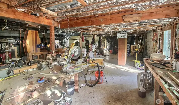 Front Left of the 1590 sq ft basement with full of possibilities. 40' Steel beam can be laid out to make one large room with enough ceiling height
