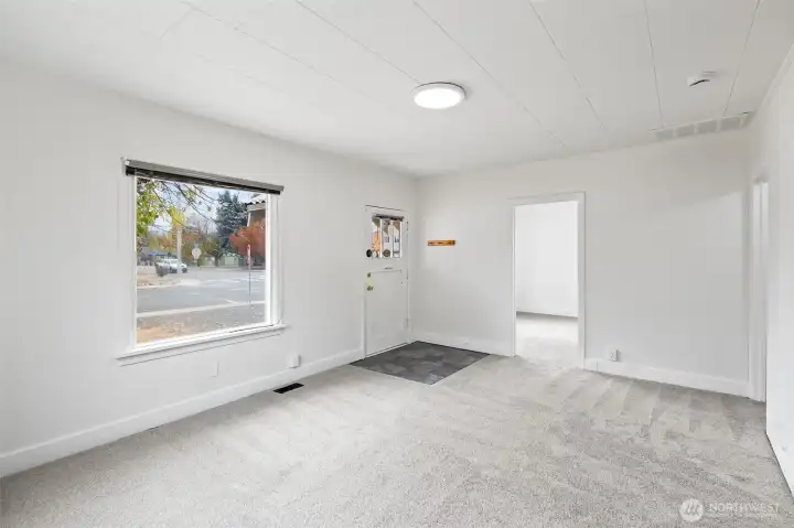 Fresh paint and flooring throughout.