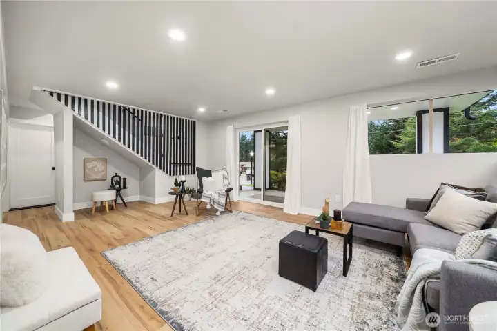 Beautoiful family room downstairs with walk out covered patio.