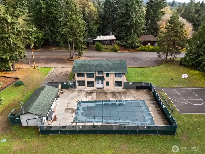 Private clubhouse, pool and sport court for Miller Bay residents