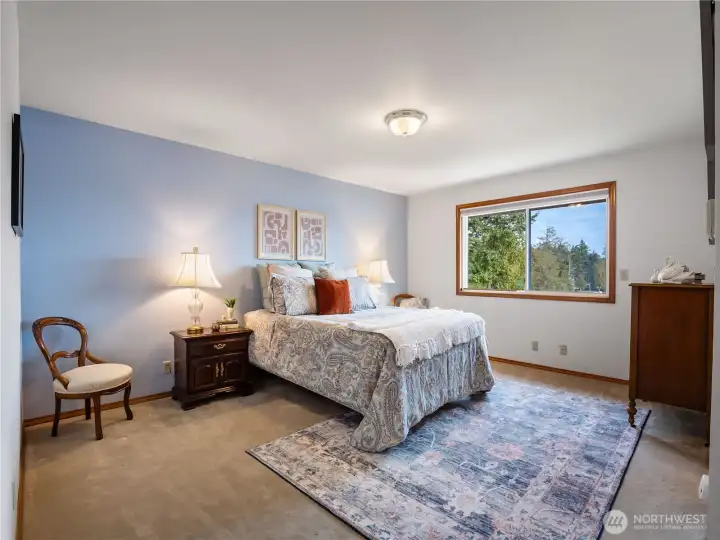 Step into your private retreat call the primary bedroom through double doors.