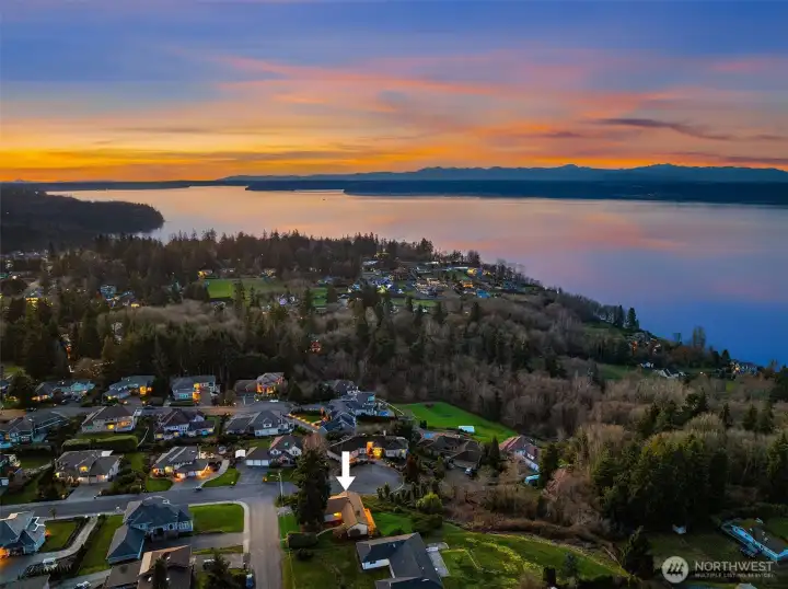 Welcome to the Pacific Northwest with this view property overlooking a wide kaleidoscope of vistas stretching North-South.