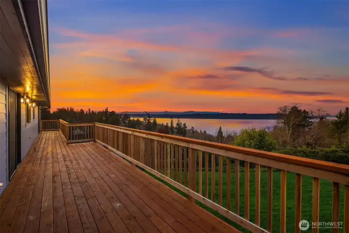 A generously sized deck follows the whole length of the house.