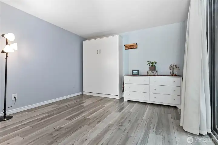 Second bedroom with Murphy bed for quick and easy flex space.