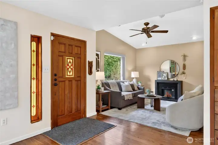 The front door opens to the living room and dining room