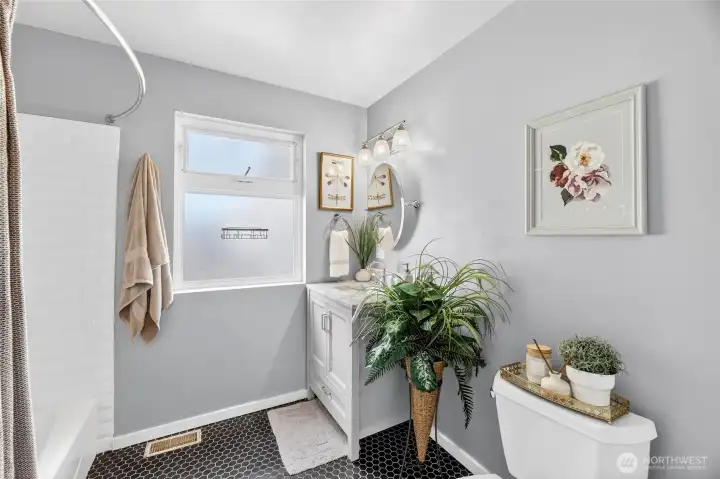 Full Bathroom with updated tile flooring