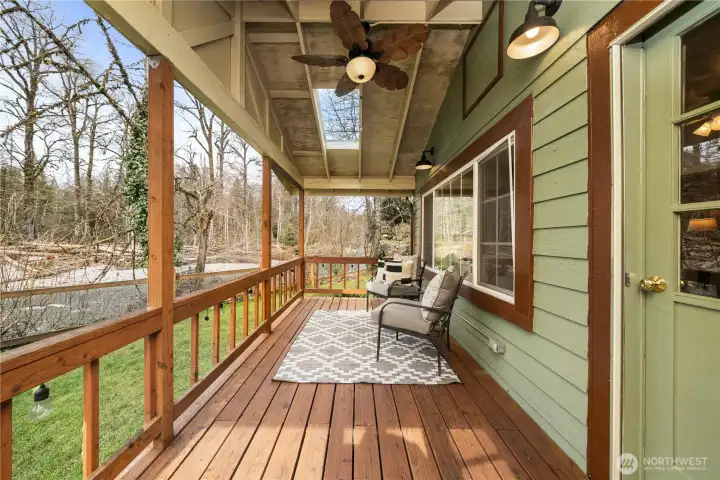 Relax on the covered front porch and enjoy the soothing sounds of the river.