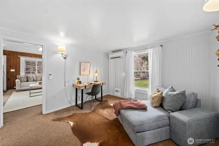 Bright, flexible space perfect for an office, playroom, or lounge.