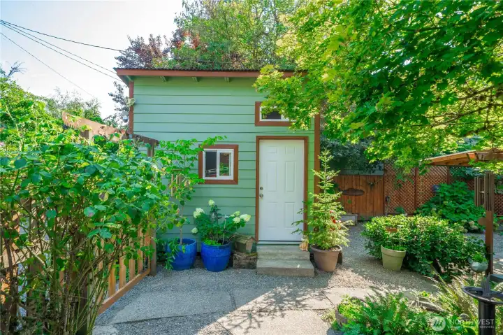 Multiple outbuildings and carports for added storage.