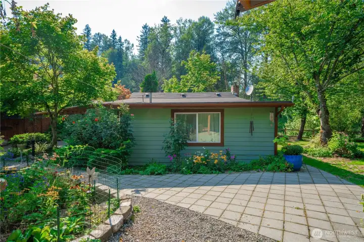 Hardscape and vibrant blooms create a stunning and practical outdoor area.