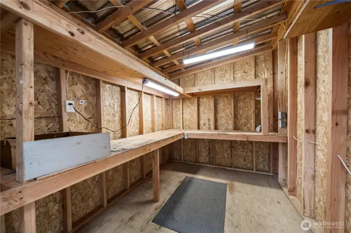 Workshop located behind the largest outbuilding - has lots of electrical outlets and lights.