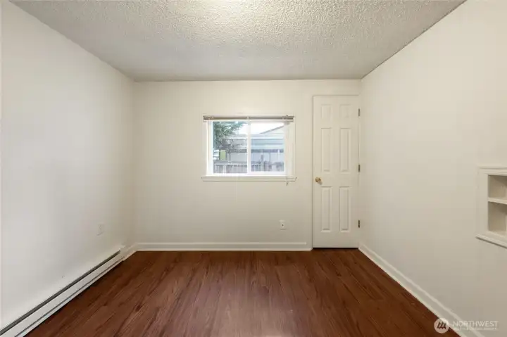 Spacious bedroom with closet and natural light