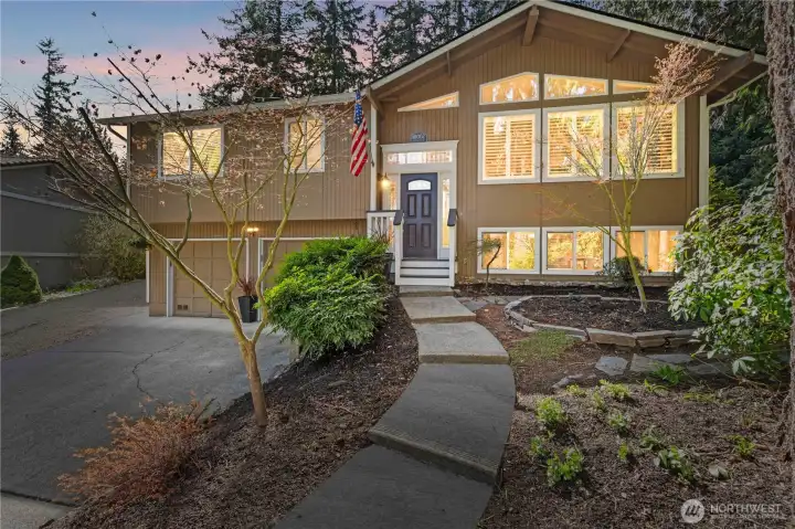 tastefully updated home perched across from Lake Tapps with peek a boo view of Lake Tapps