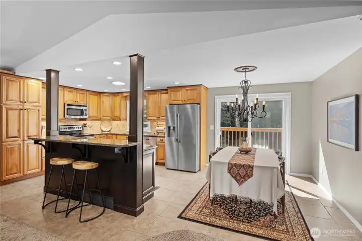 dining room with sleek bar great for entertaining