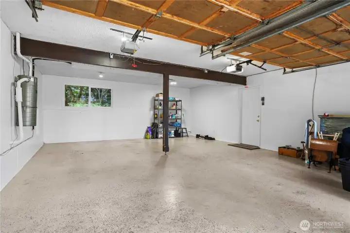 spacious 2 car garage plus workspace