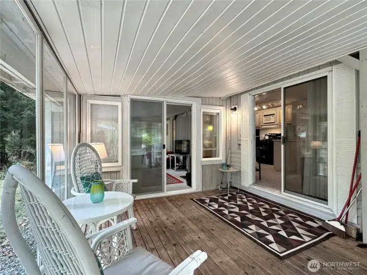 The entrance begins with a covered porch