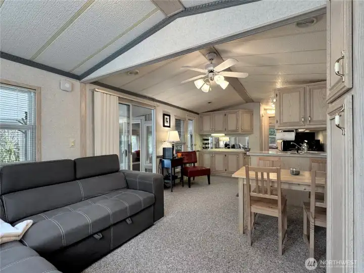 Additional view of living area highlighting seating and flow