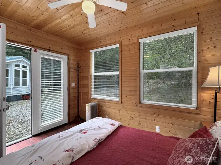 Inside the shed is another queen bed