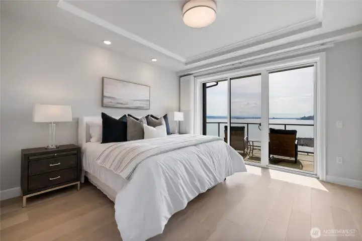 Wake up to stunning Mount Rainier and Sound views from your primary bedroom and private balcony