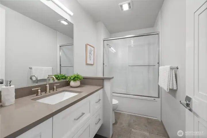 Stylish bathroom with upgraded glass shower door