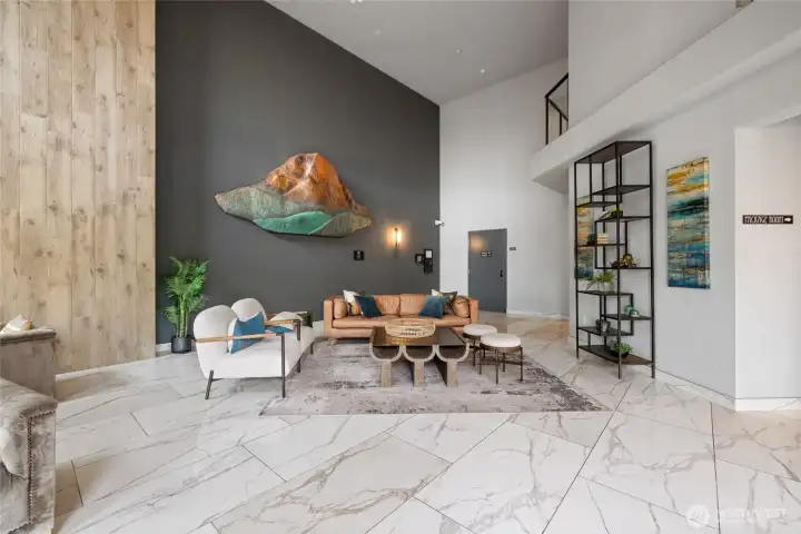 Elegant and inviting lobby with multiple seating areas for relaxing or gathering with guests