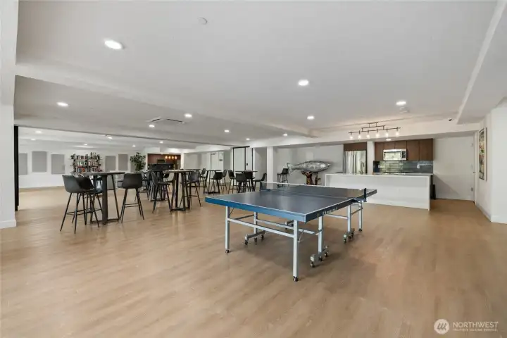 Exclusive 5th-floor resident lounge.  Expansive entertainment lounge featuring a pool table, grand piano, two kitchens, flexible party spaces, multiple seating and dining areas, plus outdoor deck and BBQ area