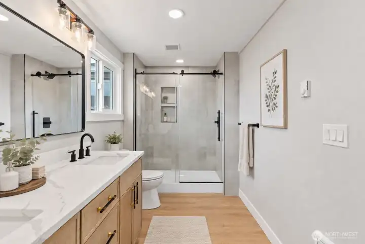 Primary bathroom. Virtually staged furniture.