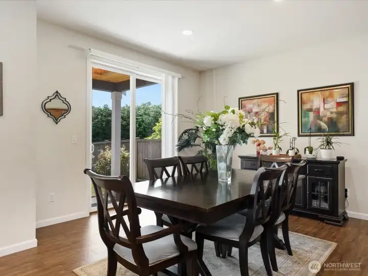 Sliding door to the covered patio and fenced backyard.