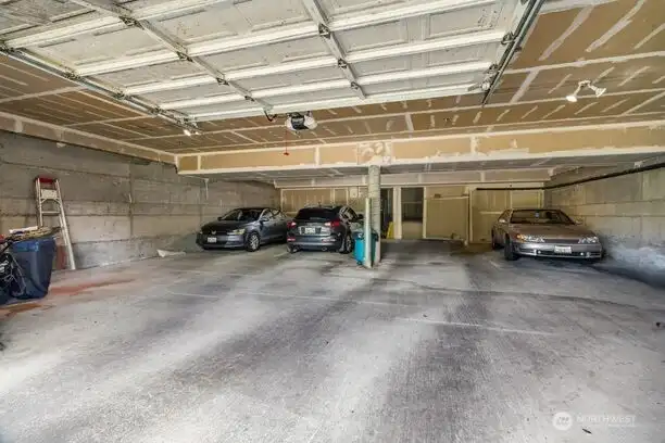 The shared garage is huge, and that open space? That’s your designated parking spot, nicely tucked out of the elements.
