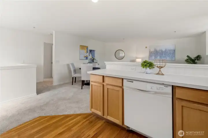 Back upstairs, the hallway leads to all three bedrooms, both bathrooms, and the oversized laundry room, keeping the private spaces nicely tucked away from the main living area.