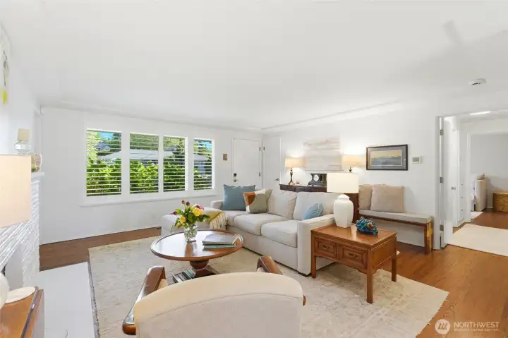 Spacious living & family rooms, each with a fireplace, provide inviting spaces for everyday living & entertaining
