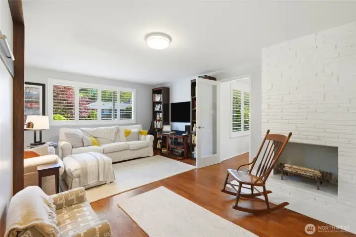 The family room includes a built-in Murphy bed, creating flexible space for guests, a home office, or multi-purpose living
