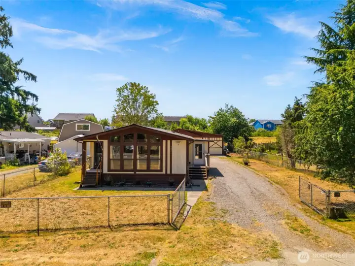 Completely fenced yard with electronic gate