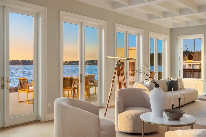 The many doors opening to the outdoors naturally draw you toward the surrounding beauty—a true invitation to breathe in the sea air and wander along the sand.