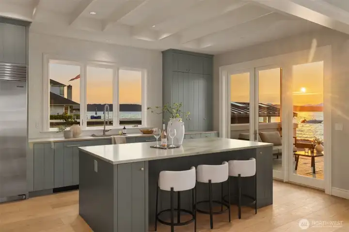 The island, with its additional storage, is the perfect place to join in meal prep while taking in the glow of the setting sun.