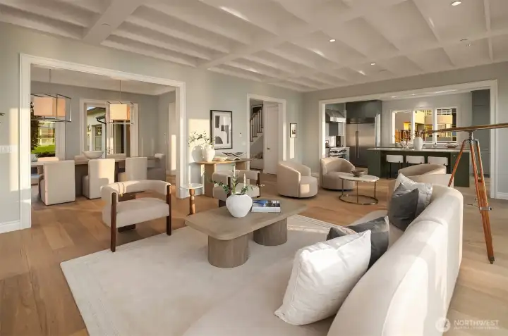 Back in the great room, this view captures the easy flow between the living, kitchen, and dining areas—distinct yet seamlessly connected for comfortable, open-concept living.