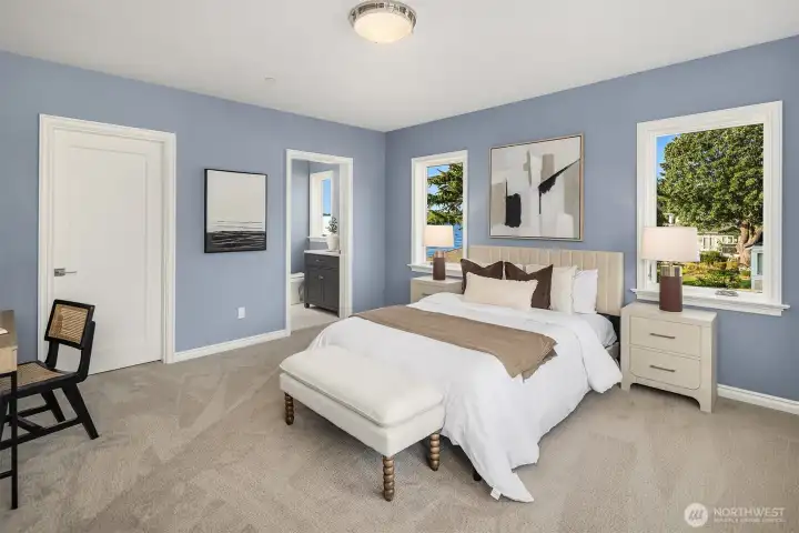 One of the guest ensuite bedrooms, wrapped in serene coastal tones—plush underfoot, bathed in natural light, and complete with its own private bath and walk-in closet.