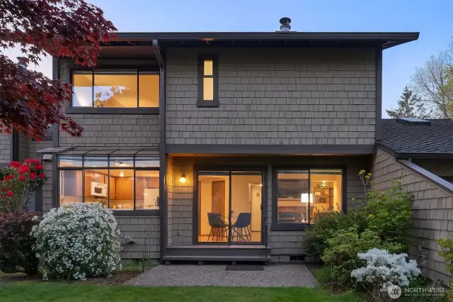 The back of the home faces south where you can enjoy natural light into the kitchen, dining and family rooms. Inviting back patio opens onto a beautifully landscaped greenbelt.