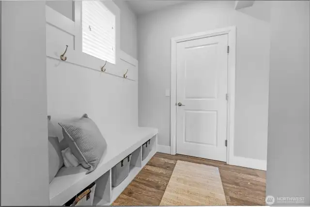 quaint mudroom concept as you enter from the garage